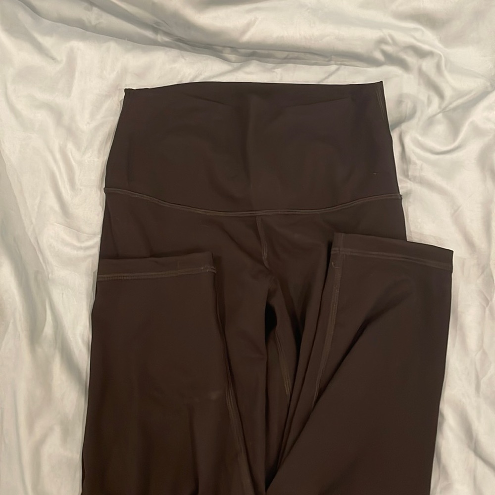 A little bit below knee length black legging super cute